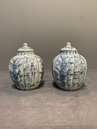 A pair of Chinese blue and white jarlets and covers with figural and floral design, Wanli