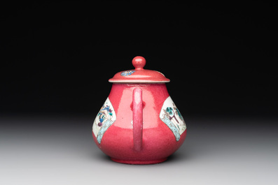 A Chinese famille rose ruby-ground 'landscape scroll' teapot, Yongzheng