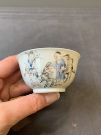 A Chinese blue-enamelled gilt-decorated grisaille cup and saucer, Yongzheng