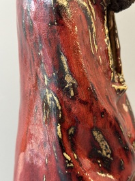 A Chinese Shiwan flamb&eacute;-glazed figure of a Luohan, Deng 邓 seal mark, dated 1927
