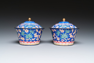 A pair of Chinese Canton enamel bowls and covers with floral design, Qianlong