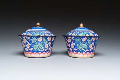 A pair of Chinese Canton enamel bowls and covers with floral design, Qianlong