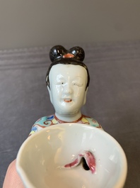 A Chinese famille rose figure of a lady presenting a bowl, Qianlong