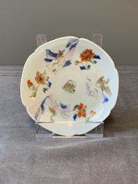 A Chinese polychrome-decorated cup and saucer with ducks and flowers, Yongzheng