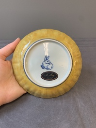 A rare Chinese blue and white yellow-glazed border chrysanthemum-shaped plate with figural design, hare mark, Jiajing