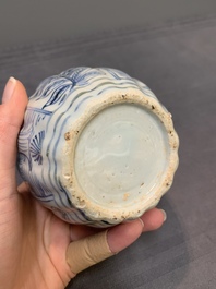 A pair of Chinese blue and white jarlets and covers with figural and floral design, Wanli