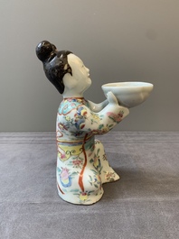 A Chinese famille rose figure of a lady presenting a bowl, Qianlong