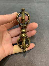 Three Tibetan bronze vajra and a copper incense burner, 18/20th C.