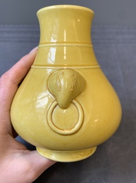 A Chinese yellow-glazed 'hu' vase, Qianlong mark, 19/20th C.