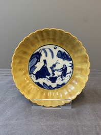 A rare Chinese blue and white yellow-glazed border chrysanthemum-shaped plate with figural design, hare mark, Jiajing