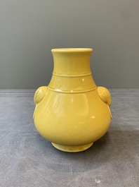 A Chinese yellow-glazed 'hu' vase, Qianlong mark, 19/20th C.