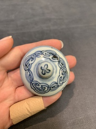 A pair of Chinese blue and white jarlets and covers with figural and floral design, Wanli