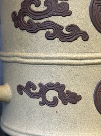 A pair of very rare Chinese Yixing stoneware 'duomuhu' ewers and covers, Kangxi