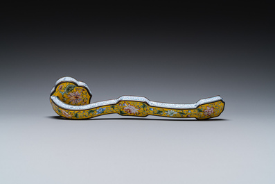 A Chinese Beijing enamel yellow-ground 'bajixiang' ruyi sceptre, Qianlong mark, 19/20th C.