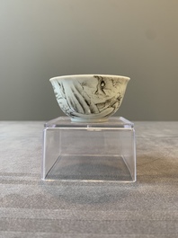 A Chinese blue-enamelled gilt-decorated grisaille cup and saucer, Yongzheng