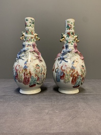A pair of Chinese famille rose '18 Luohan' bottle vases, 19th C.