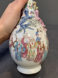 A pair of Chinese famille rose '18 Luohan' bottle vases, 19th C.