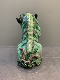 A Chinese verte biscuit group of a Buddhist lion with cub, 19th C.