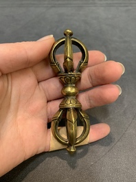 Three Tibetan bronze vajra and a copper incense burner, 18/20th C.