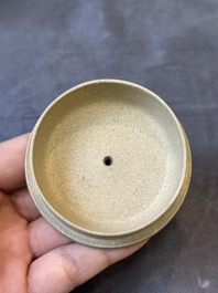 A pair of very rare Chinese Yixing stoneware 'duomuhu' ewers and covers, Kangxi