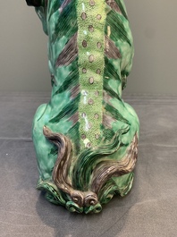 A Chinese verte biscuit group of a Buddhist lion with cub, 19th C.