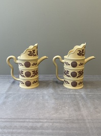 A pair of very rare Chinese Yixing stoneware 'duomuhu' ewers and covers, Kangxi