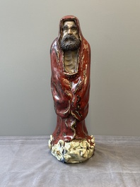 A Chinese Shiwan flamb&eacute;-glazed figure of a Luohan, Deng 邓 seal mark, dated 1927