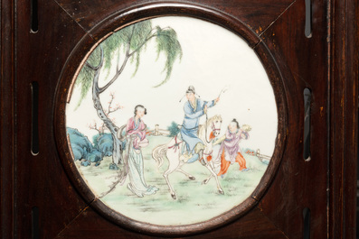 A Chinese four-fold wooden room divider with famille rose 'Romance of the Western Chamber' plaques, Republic