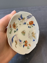 A Chinese polychrome-decorated cup and saucer with ducks and flowers, Yongzheng
