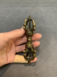Three Tibetan bronze vajra and a copper incense burner, 18/20th C.