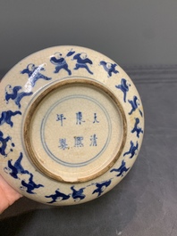 A pair of Chinese blue and white soft paste '100 boys' covered jarlets and a seal paste box, Kangxi mark, 19th C.