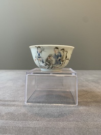 A Chinese blue-enamelled gilt-decorated grisaille cup and saucer, Yongzheng