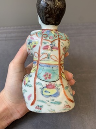 A Chinese famille rose figure of a lady presenting a bowl, Qianlong