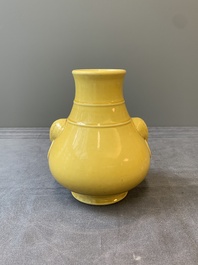 A Chinese yellow-glazed 'hu' vase, Qianlong mark, 19/20th C.