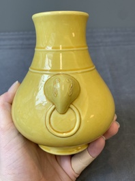 A Chinese yellow-glazed 'hu' vase, Qianlong mark, 19/20th C.