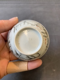 A Chinese blue-enamelled gilt-decorated grisaille cup and saucer, Yongzheng