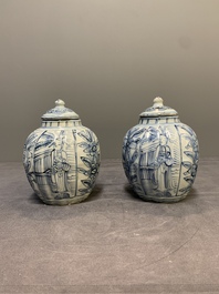 A pair of Chinese blue and white jarlets and covers with figural and floral design, Wanli