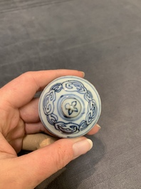 A pair of Chinese blue and white jarlets and covers with figural and floral design, Wanli