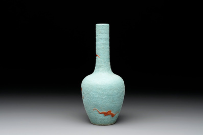 A Chinese iron-red-decorated turquoise-ground bottle vase with bats, Qianlong mark, 20th C.