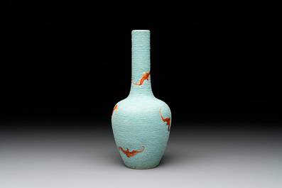A Chinese iron-red-decorated turquoise-ground bottle vase with bats, Qianlong mark, 20th C.