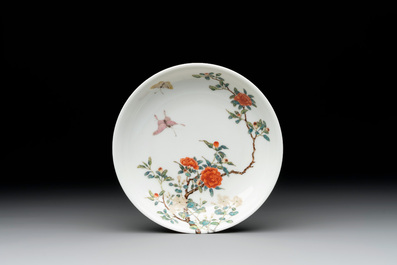 A Chinese famille rose 'butterfly and peony' plate, Yongzheng mark, 19/20th C.