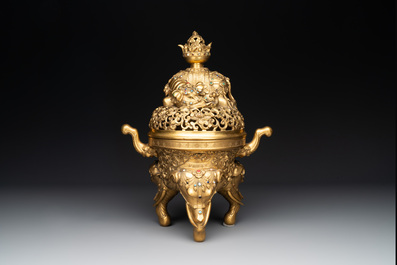 A large Chinese precious stone-inlaid gilt bronze 'elephant' tripod censer and cover on wooden stand, 19th C.