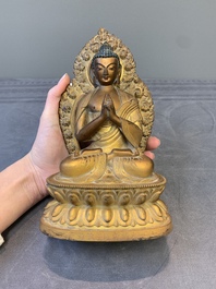 A fine Chinese gilt bronze Buddha, Qianlong mark and of the period
