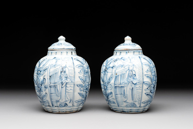 A pair of Chinese blue and white jarlets and covers with figural and floral design, Wanli