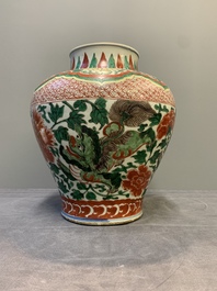 A Chinese wucai 'Buddhist lion and peony scroll' vase, Transitional period