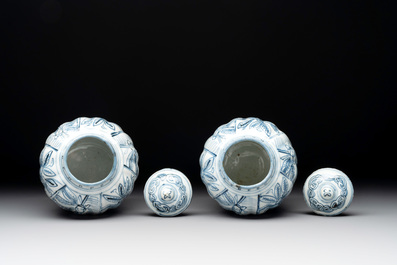 A pair of Chinese blue and white jarlets and covers with figural and floral design, Wanli