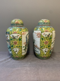 A pair of Chinese famille verte yellow-ground vases and covers with narrative design, 19th C.
