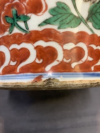 A Chinese wucai 'Buddhist lion and peony scroll' vase, Transitional period