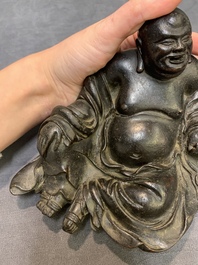 A Chinese bronze Budai, 17th C.