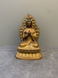 A fine Chinese gilt bronze Buddha, Qianlong mark and of the period